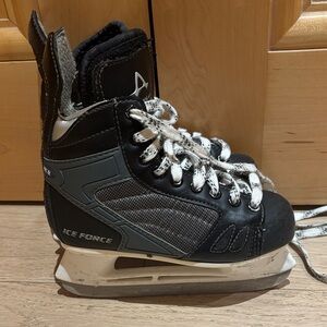 Black and Gray Ice Hockey Skates